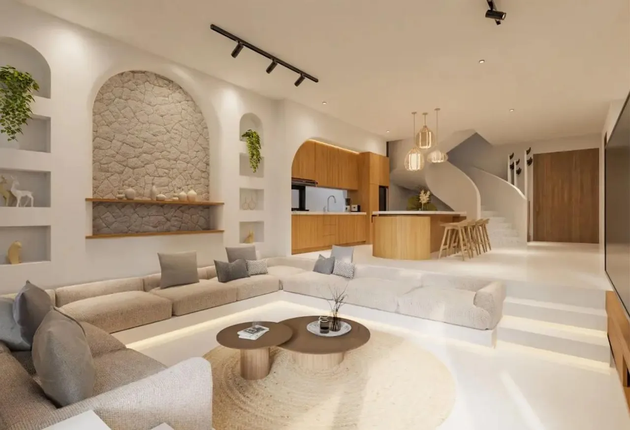 Open-plan living, kitchen and curved staircase in a villa at Dolce Resort by Wyndham Goa